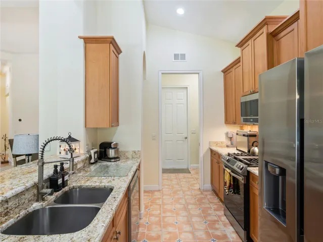 Galley Kitchen with Samsung appliances