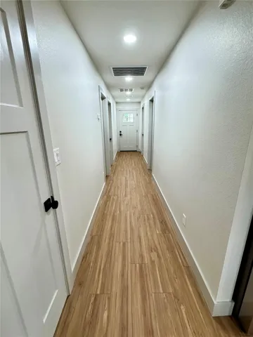 Hallway from kitchen to rear of home