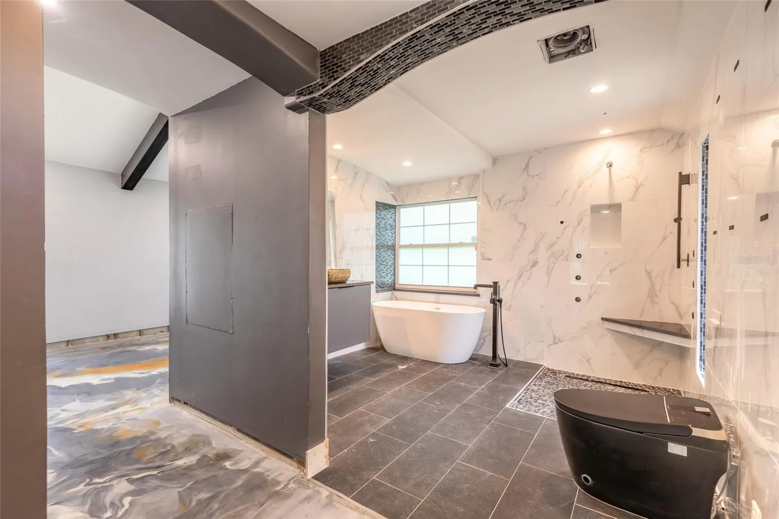 Great Room Bath or Primary Bath 1st Fl