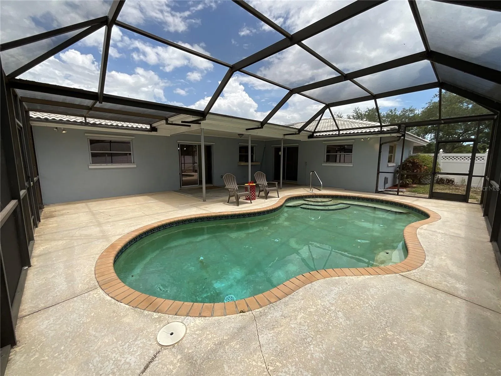 Plenty of space on this patio deck to sunbath or sit under cover
