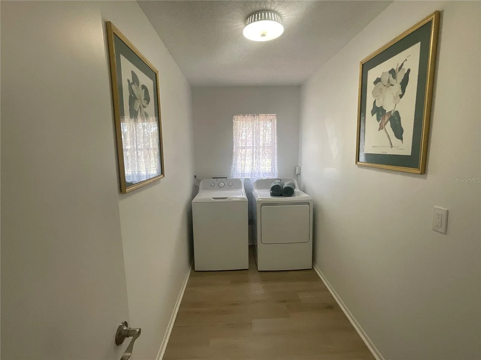 The massive bright laundry room “Shouts” spaciousness!