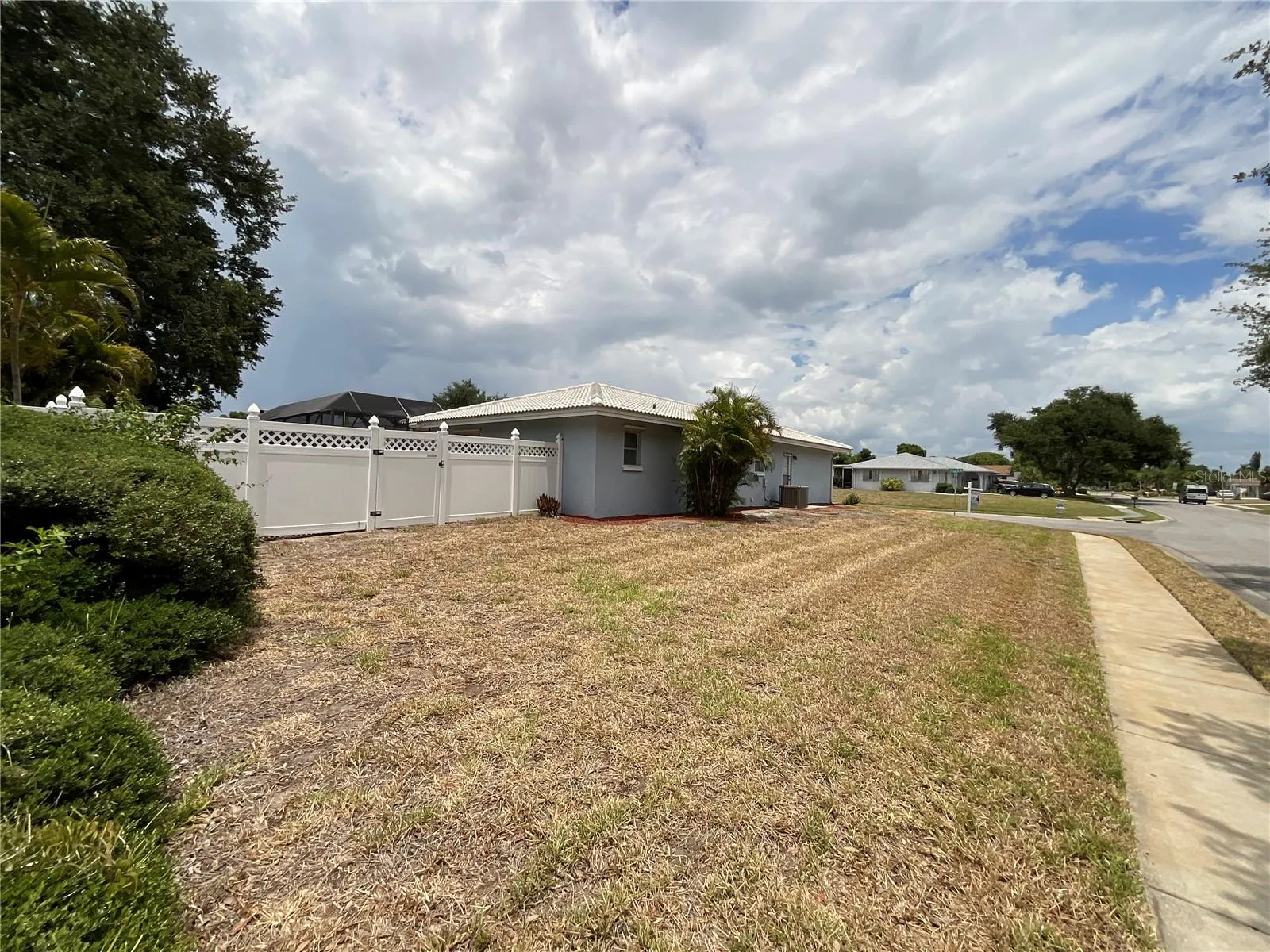 Spacious side yard on this corner lot
