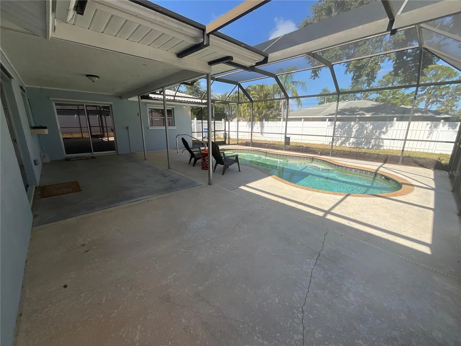 Look at the depth of this patio!  Options to sit under cover or bask in the sun!