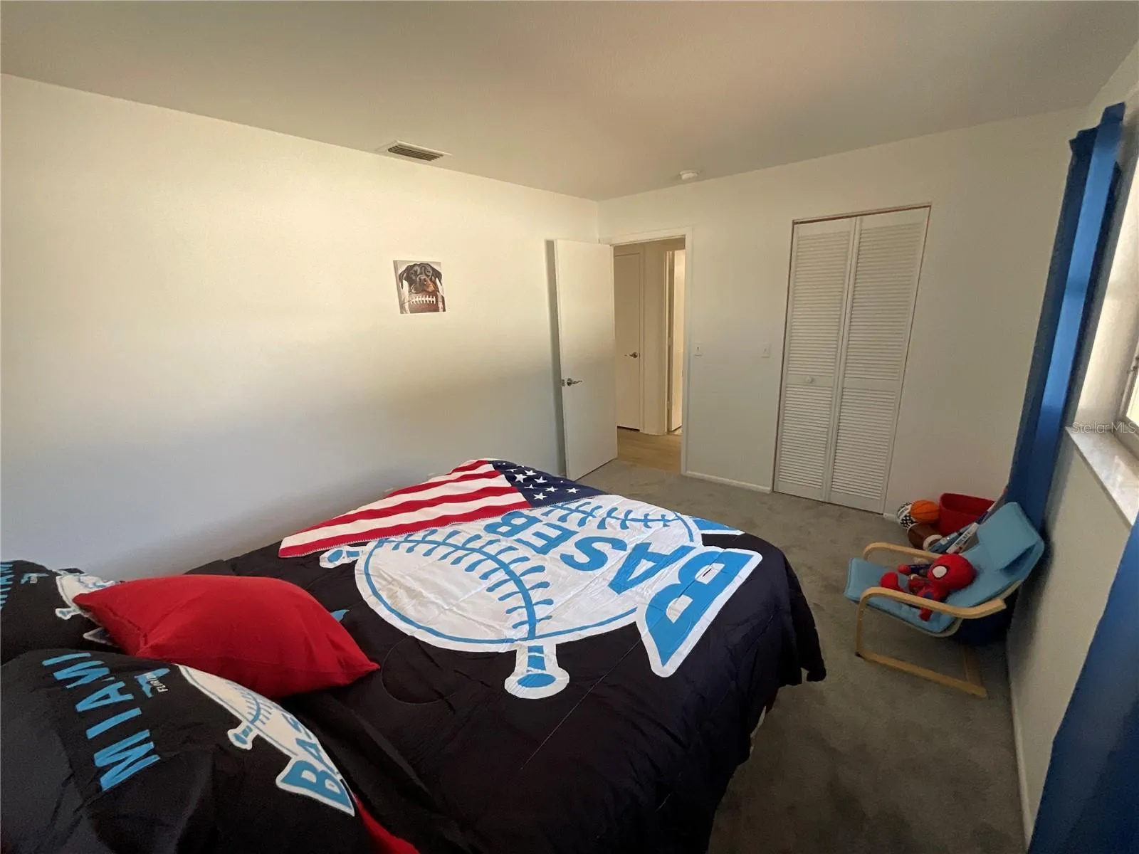 Spacious bedroom with walk-in closet