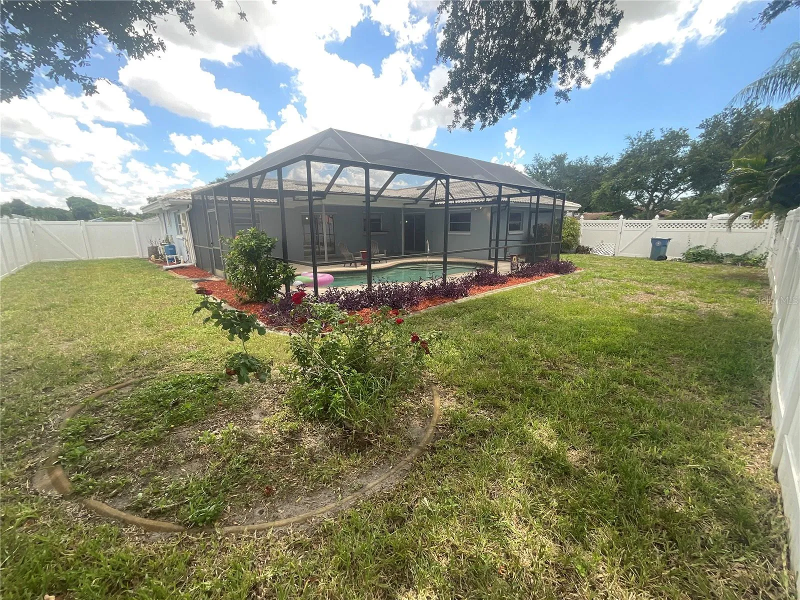 LOOK at this spacious backyard!  Back corner of yard