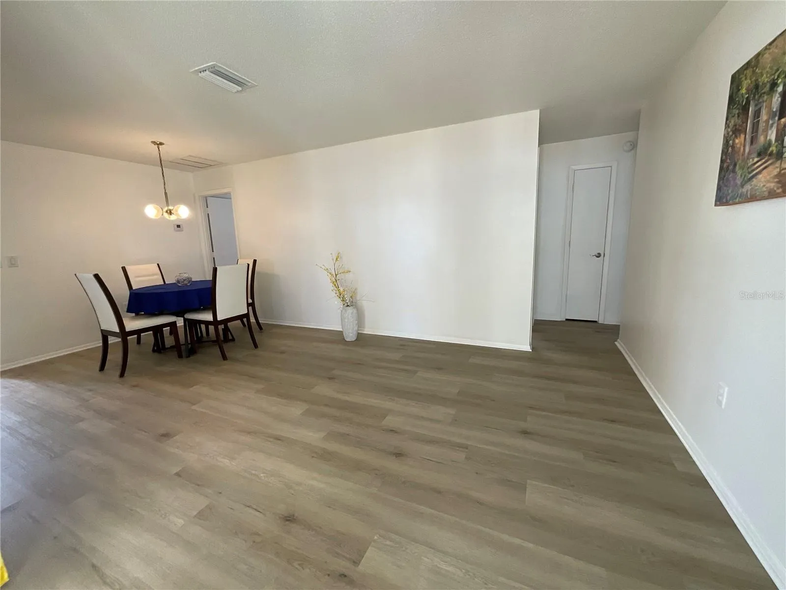 Enter through patio sliders to the dinette/family room