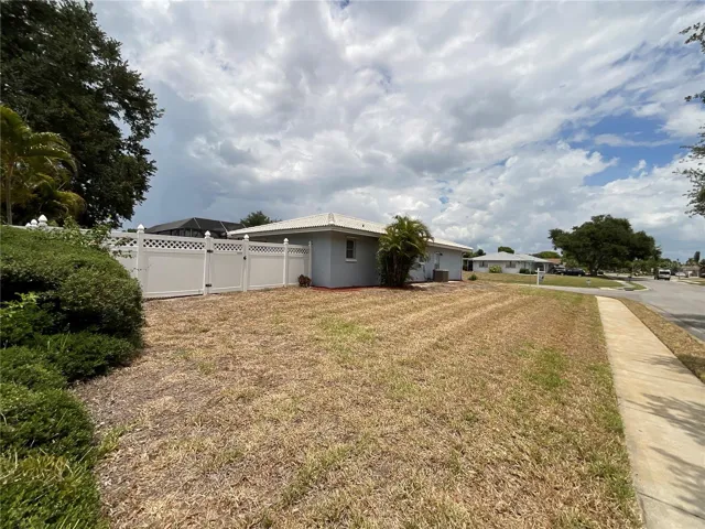 Spacious side yard on this corner lot