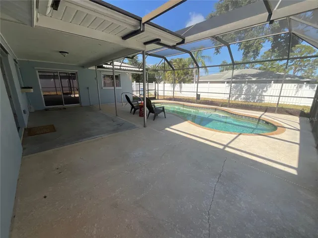 Look at the depth of this patio!  Options to sit under cover or bask in the sun!