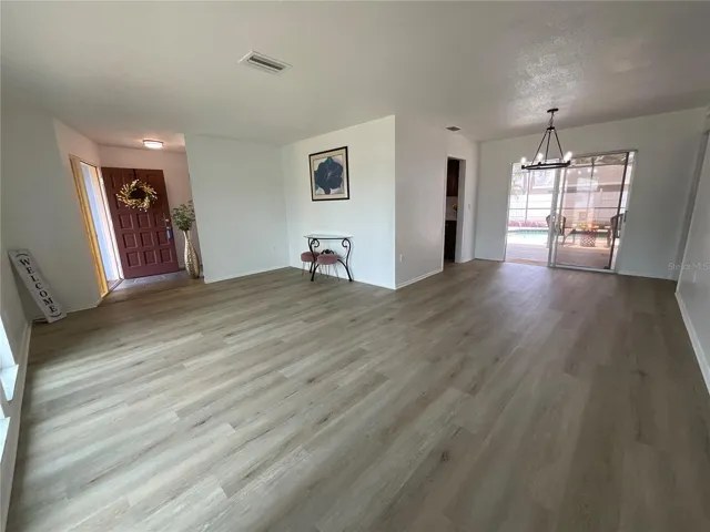 Enjoy this beautiful sitting room/family room/ dining room comgination