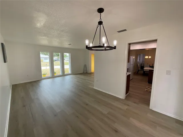 Dining area off kitchen with pocket door for privacy