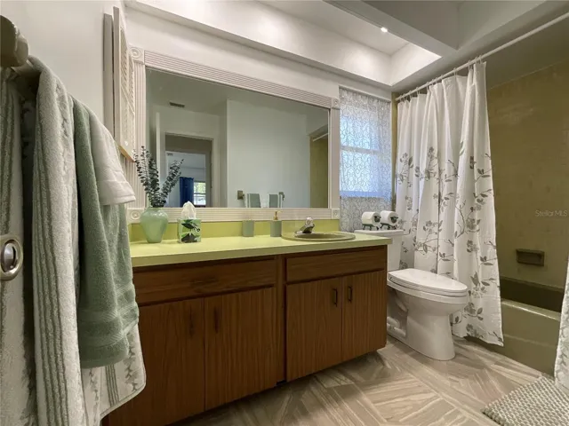 Guest bathroom with tub
