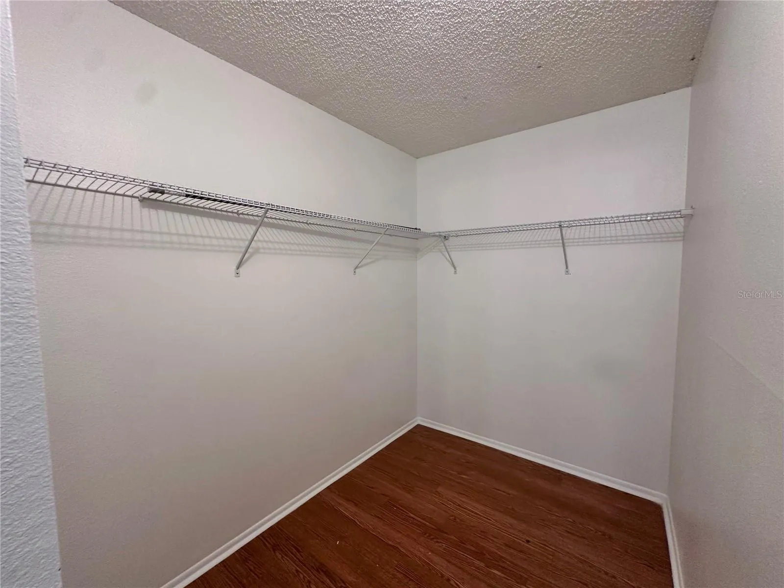 Primary Bedroom Walk in Closet