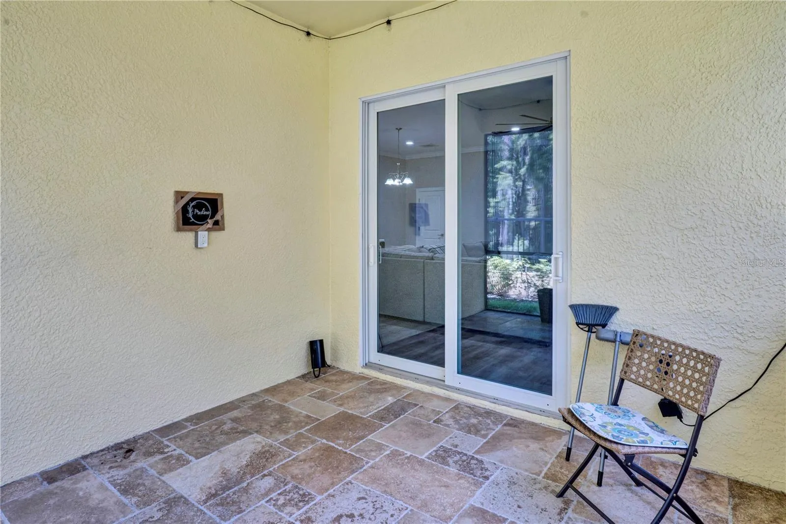 Covered screened-in patio off the living room area.
