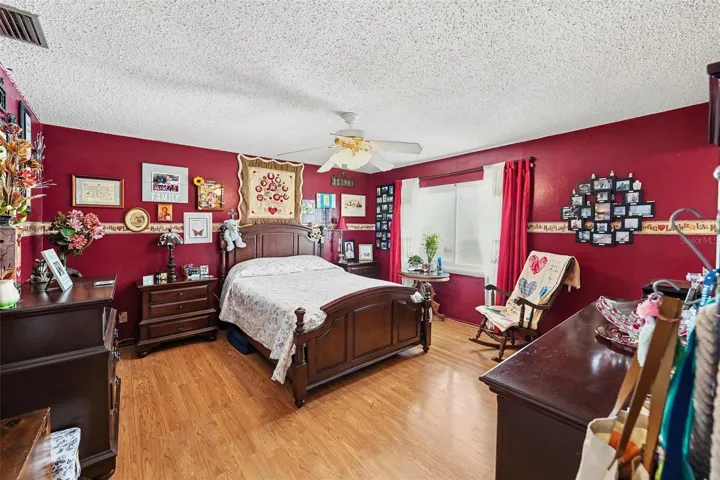 The expansive master bedroom boasts an en-suite bathroom and a walk-in closet.