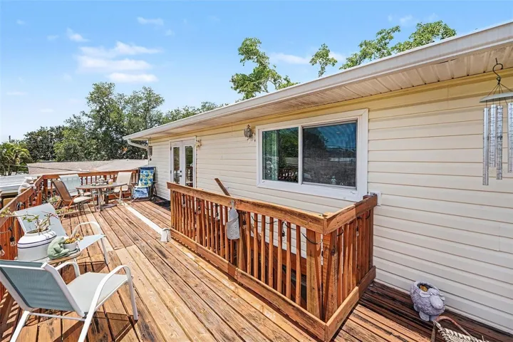 pacious deck, perfect to enjoy your morning coffee or read a book.