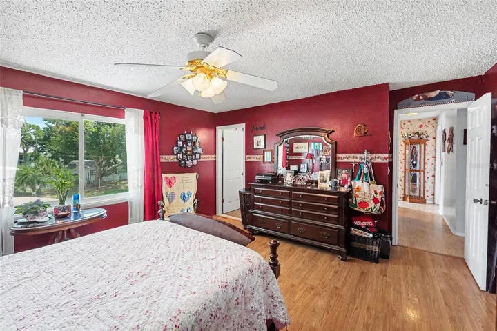 The expansive master bedroom boasts an en-suite bathroom and a walk-in closet