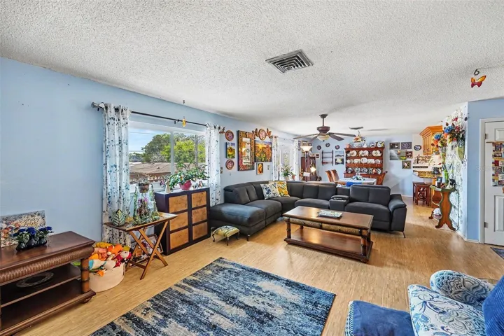 Open floor plan. The kitchen connects seamlessly to the dining and living areas.