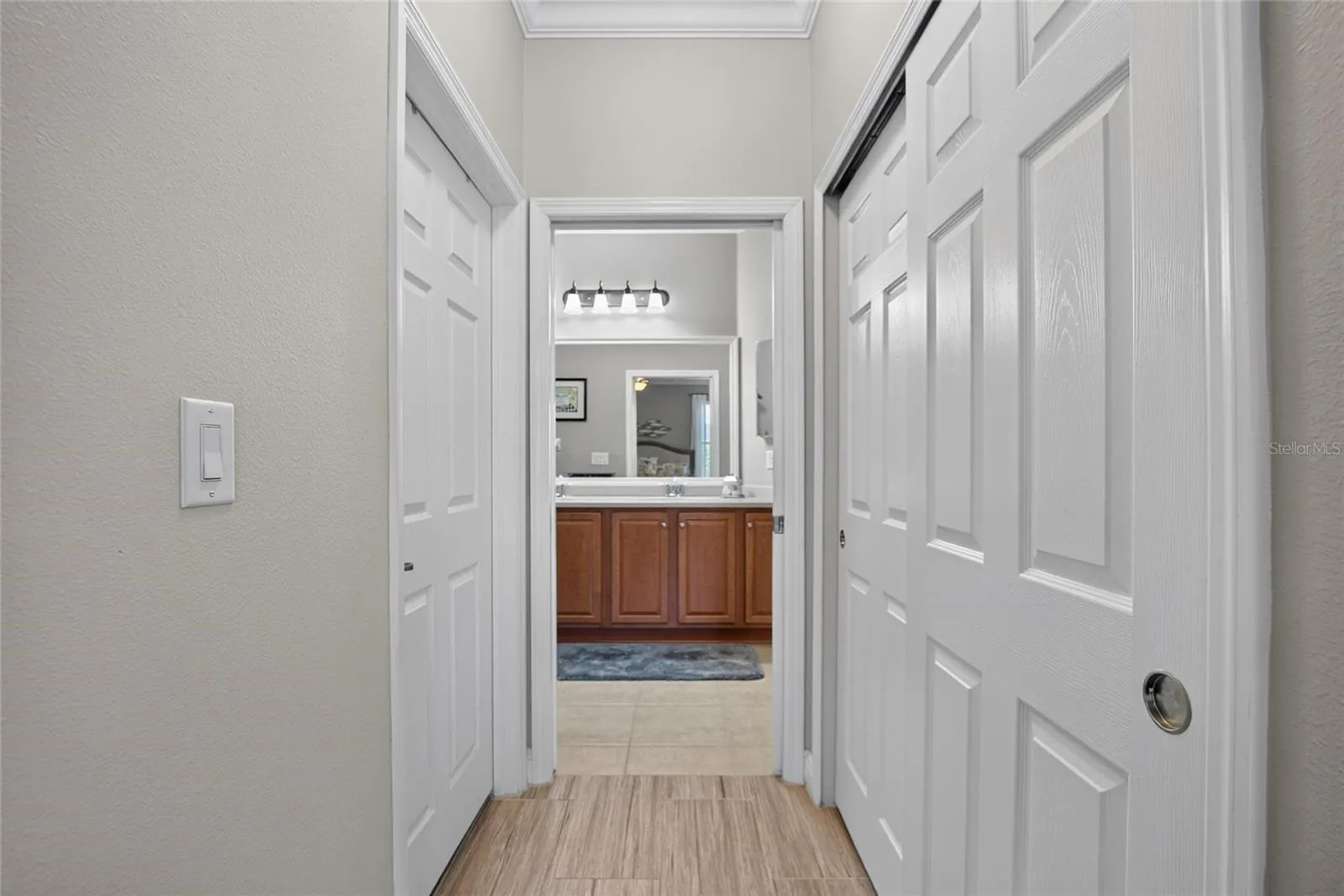 Entrance to master bathroom/double closets