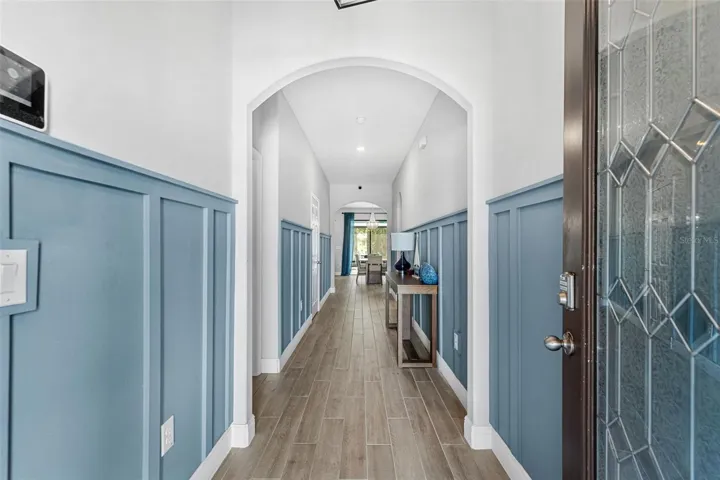 Standing at the front door