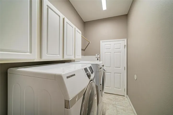 Laundry room off garage.