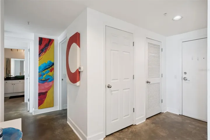 Entryway and hallway to bedrooms