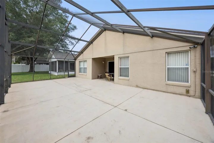Rear screened-in patio