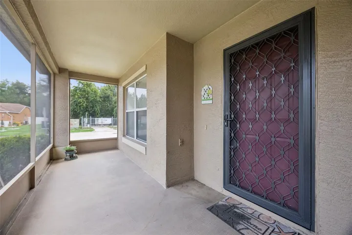 Screened and covered front patio