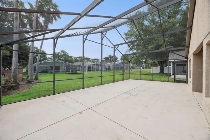 Rear screened-in patio