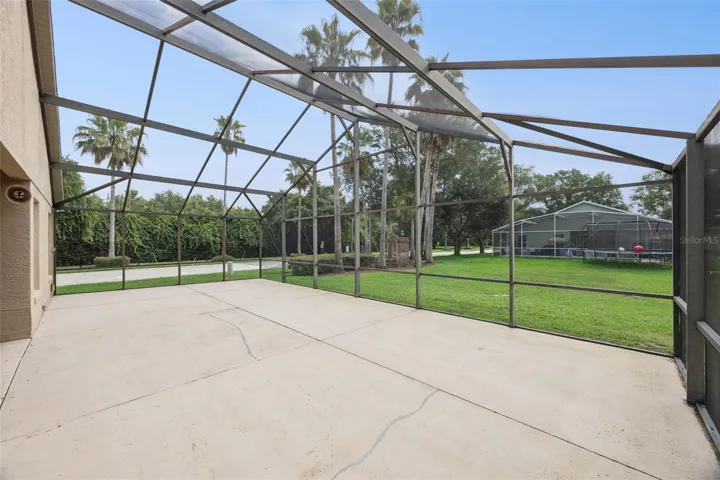 Rear screened-in patio