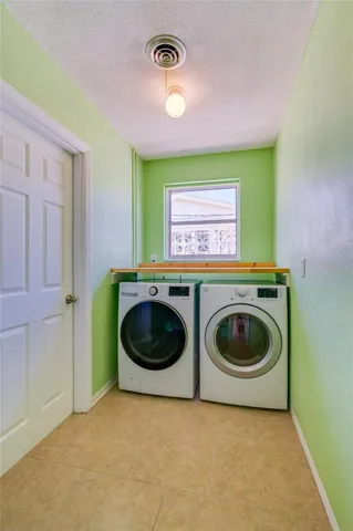 Inside laundry with front load machines