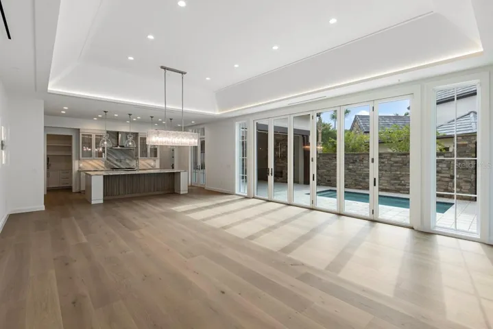 Open concept living space with dining and gourmet kitchen