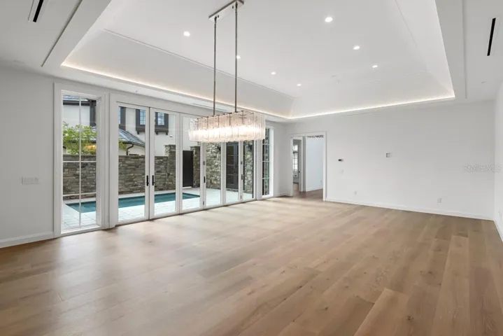 Open concept living space with dining and gourmet kitchen