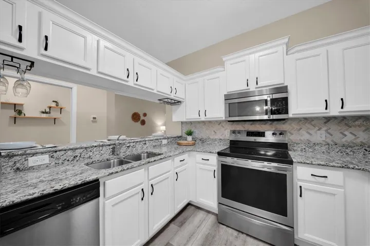 Lovely Kitchen w/Tiled Backsplash, Granite Counters
