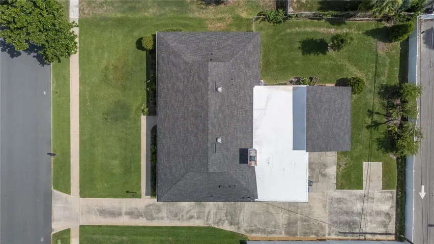 Aerial view of home and lot features