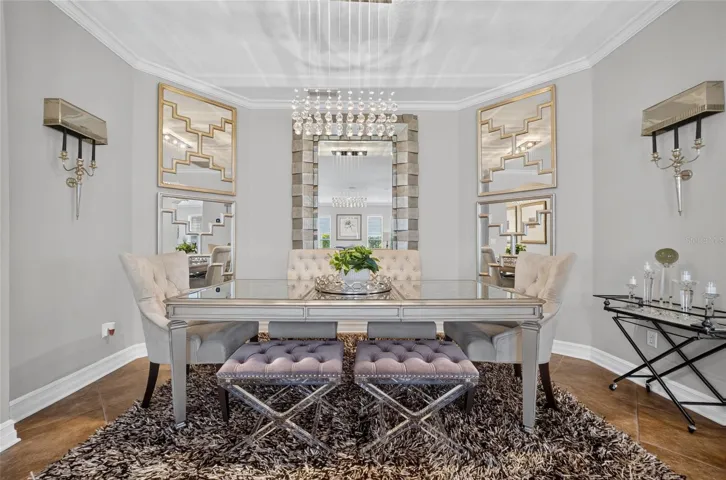 Separate formal dining room space with newer lighting