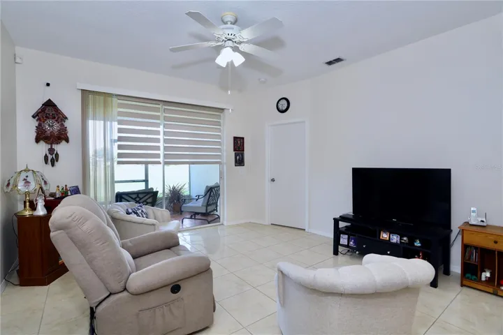 Living Room with slider to screened lanai