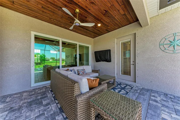 Outdoor Lounge Leading to Kitchen and Great Room