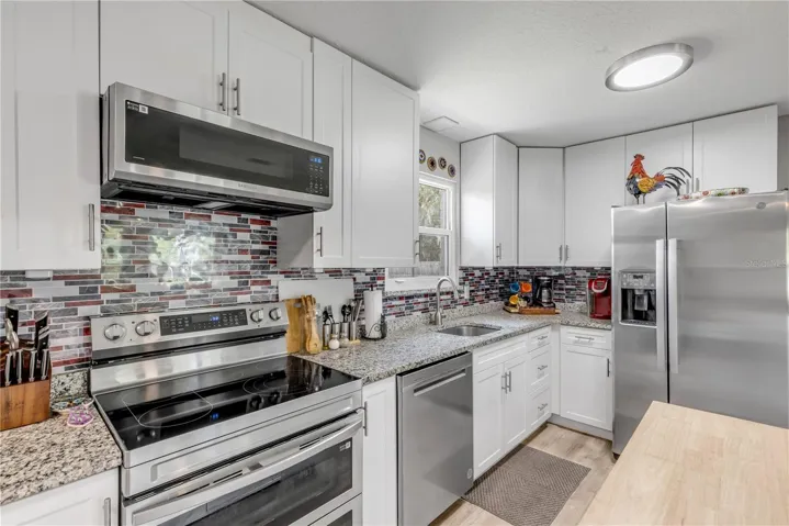 Stainless Steel Appliances and Backsplash