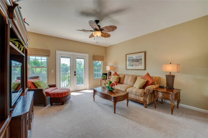 2nd floor east guest room used as a family room with private balcony