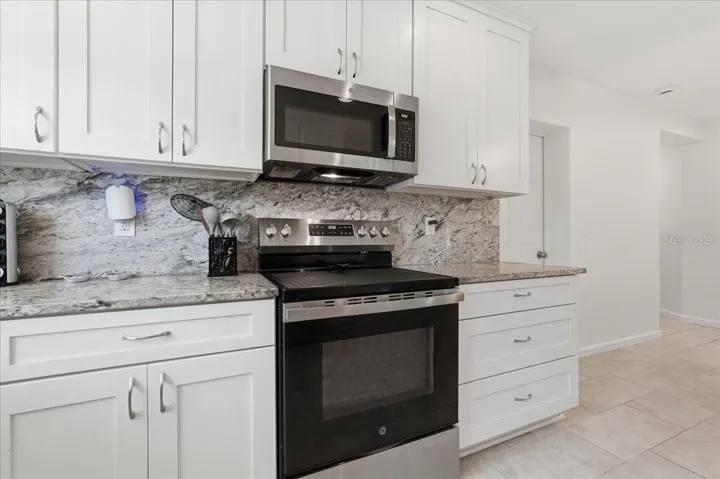 Stainless Steel Appliances and Granite Countertops in the Kitchen