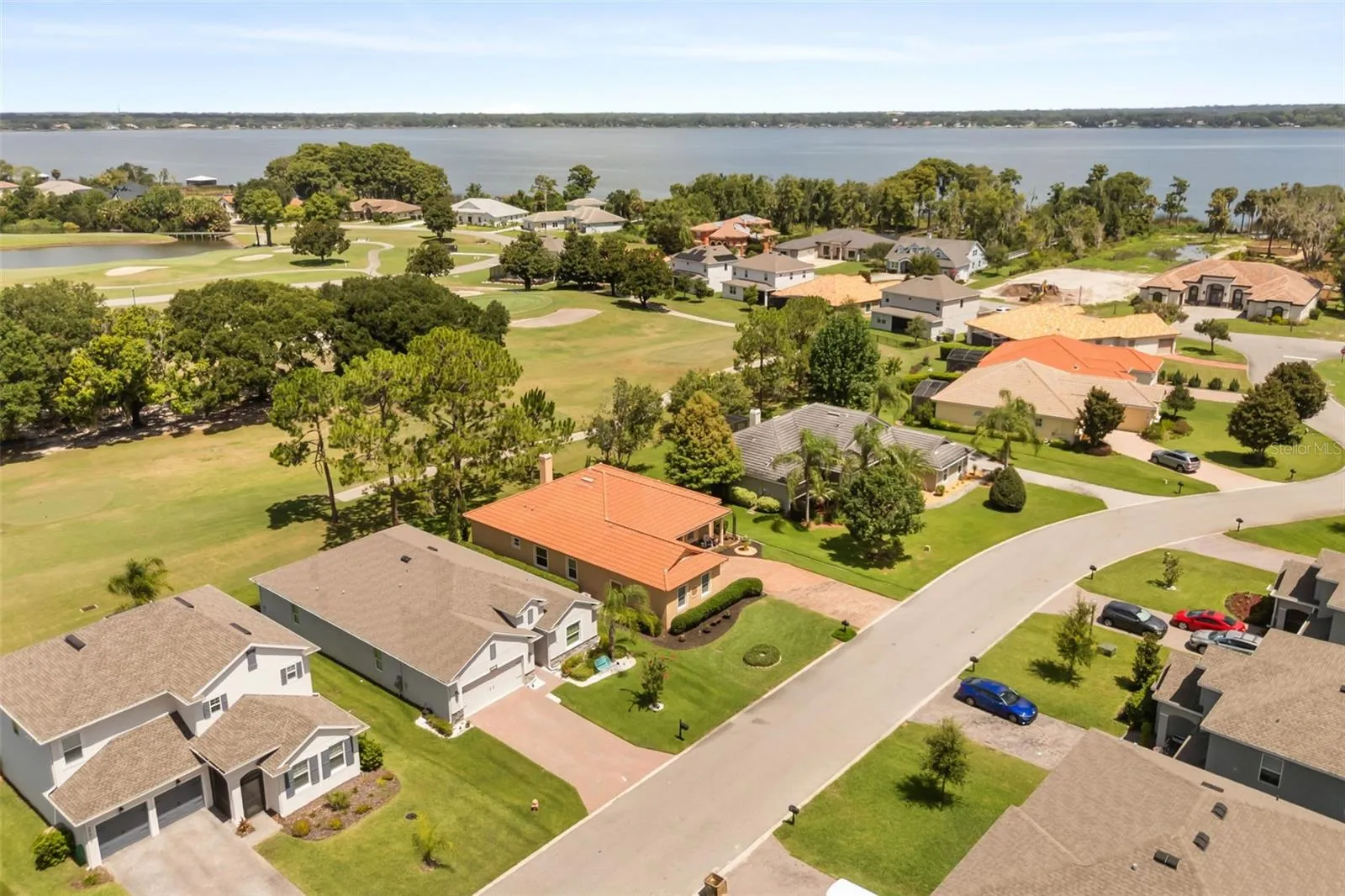 Aerial showing golf course and Lake Dora