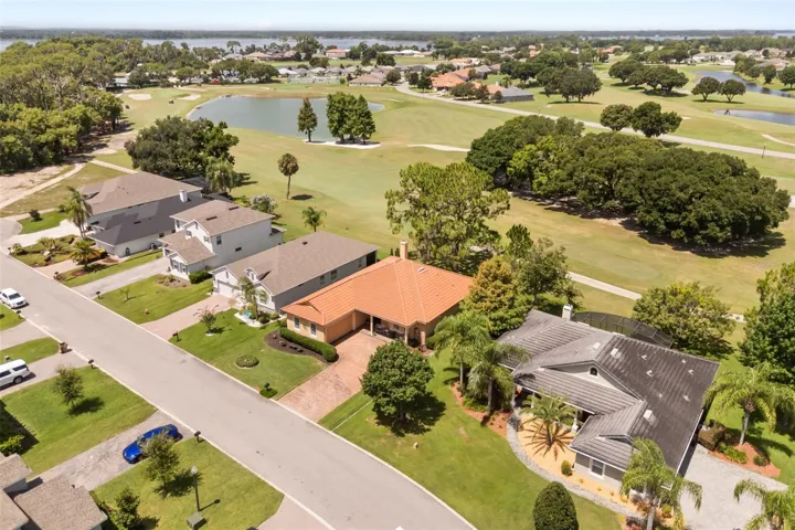 Aerial showing golf course and Lake Beauclair