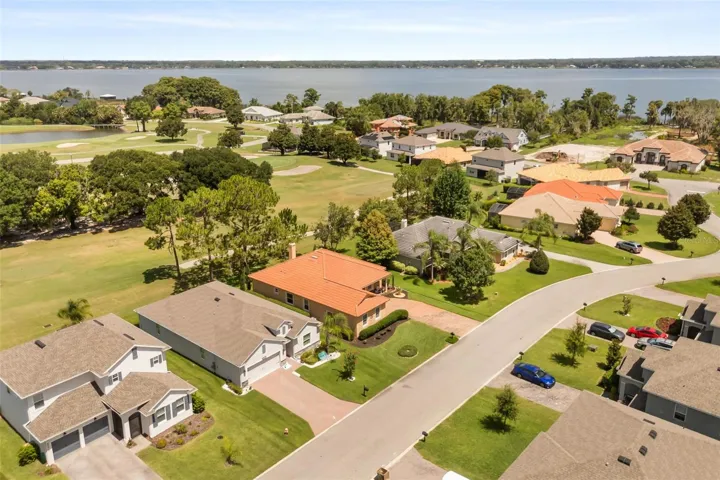 Aerial showing golf course and Lake Dora