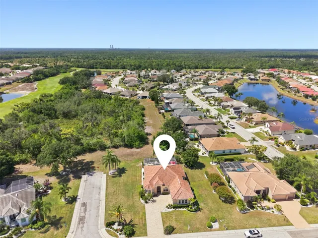Aerial, Newer Tile Roof, Large Corner Lot, Paved Driveway, Oversized 2+ Car Garage