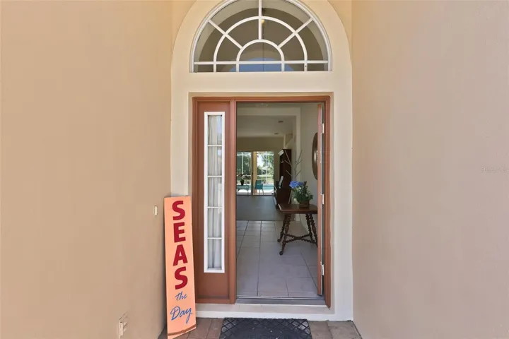 Lovely Tiled Entry with Immediate View of Fabulous Pool & Outdoor Space, Freshly Painted Interior July 2026