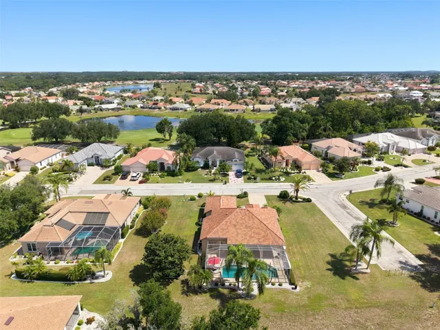 Aerial, Newer Tile Roof, Large Corner Lot, Paved Driveway, Oversized 2+ Car Garage