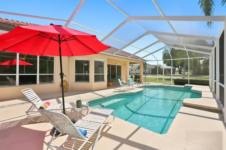 Inviting Resurfaced Pool, Painted Coolcrete Pool Deck, Large Screened Lanai