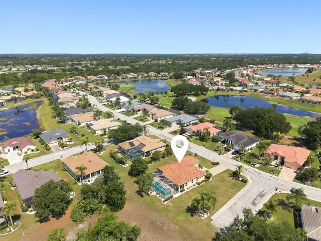 Aerial, Newer Tile Roof, Large Corner Lot, Paved Driveway, Oversized 2+ Car Garage