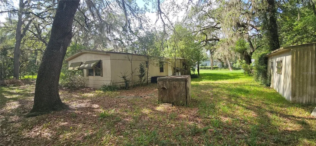 Back View of home and large yard