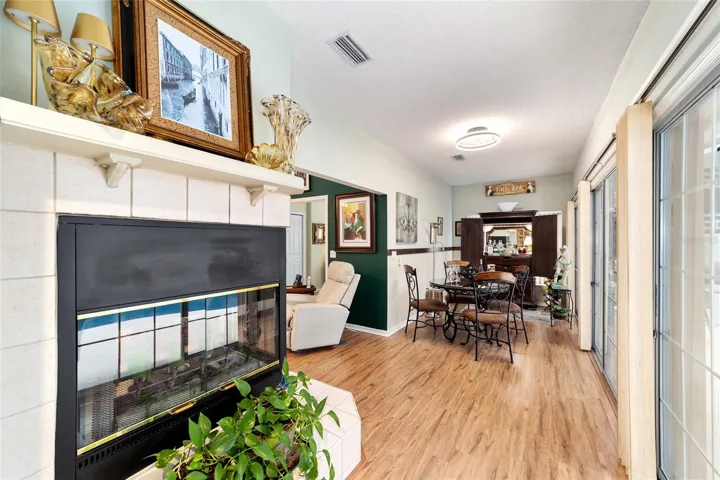 Other side of fireplace and view to Bonus Room